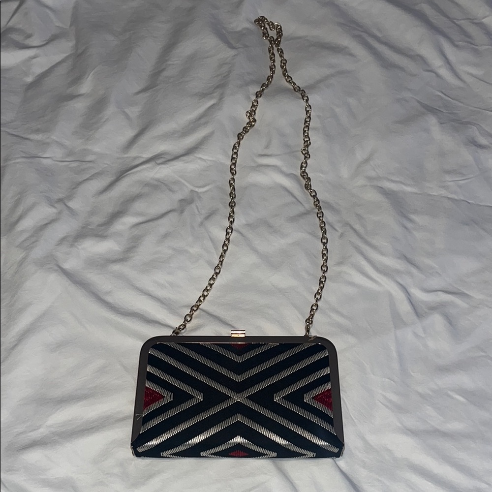 Elegant Black and Red Patterned Clutch